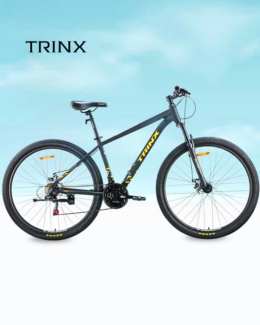 Trinx M007 size 29 Aluminum 21 speed gold