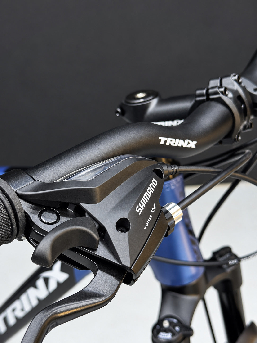دراجة جبلية TRINX X2 PRO مقاس 29 بوصة، إطار رياضي أزرق، شوكة أمامية ممتصة للصدمات، مكابح قرصية، إطارات ذات نتوءات لتضاريس متنوعة
